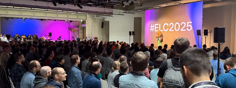A packed seated audience at the ELC Conference watching a speaker in front of a giant #ELC2025 screen, the leaders a Chief AI Officer has to bring along.