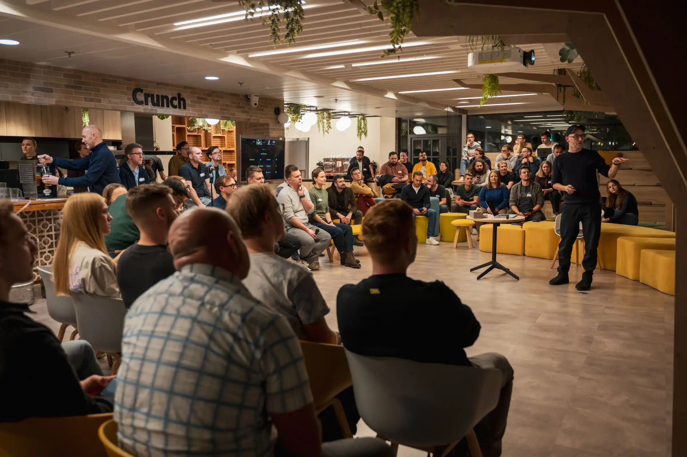 A packed ELC meetup room, around fifty engineering leaders listening to a talk, the full list a dedicated send reaches at once