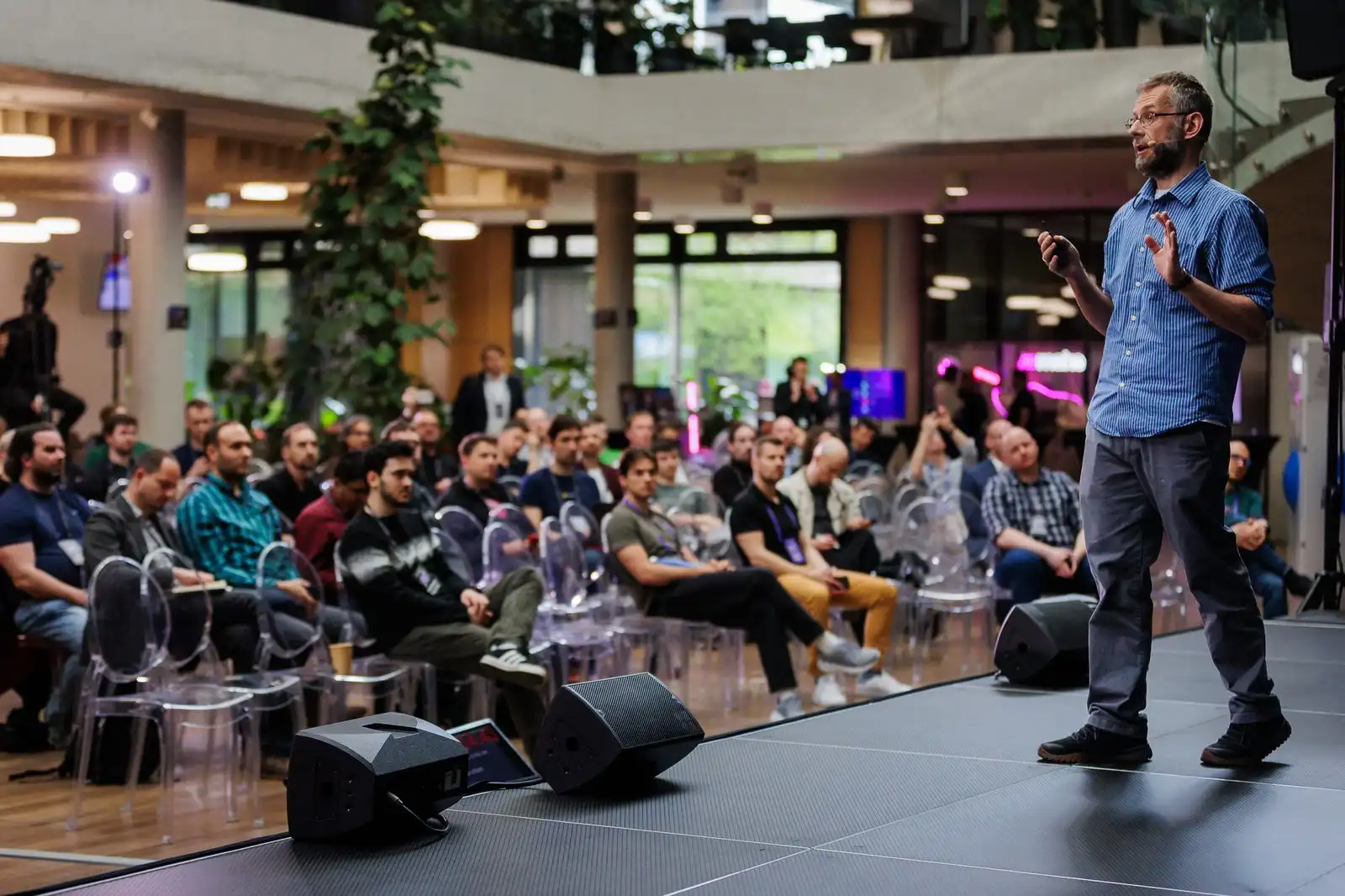A speaker on stage at ELC Conference 2026.