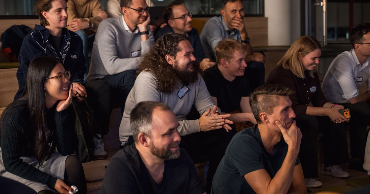 Engineering leaders listening closely during a session at an ELC meetup